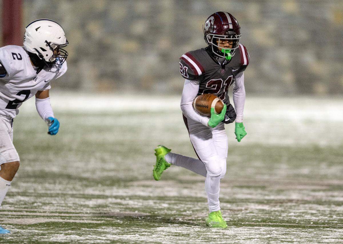 State College’s Donte Nastasi runs down the field with the ball during the game against McDowell’s on Friday, Nov. 18, 2022.