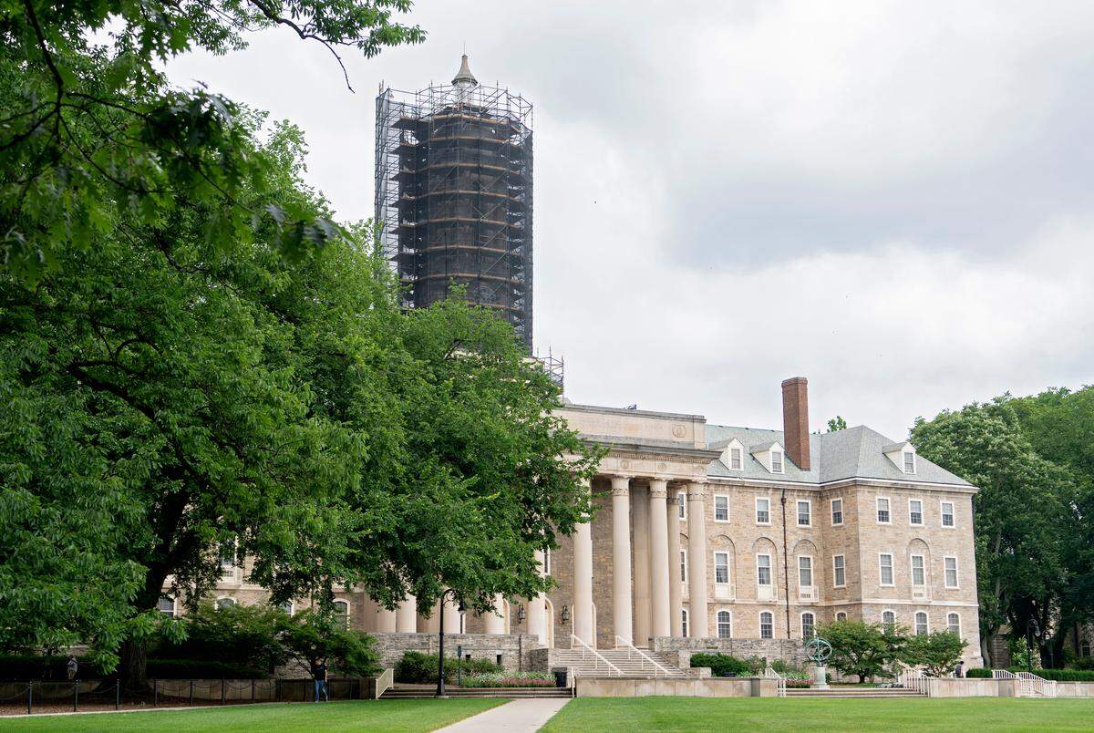 Penn State’s historic Old Main is undergoing work to restore the bell tower. On Friday, July 5, 2019, the tower is covered in scaffolding.