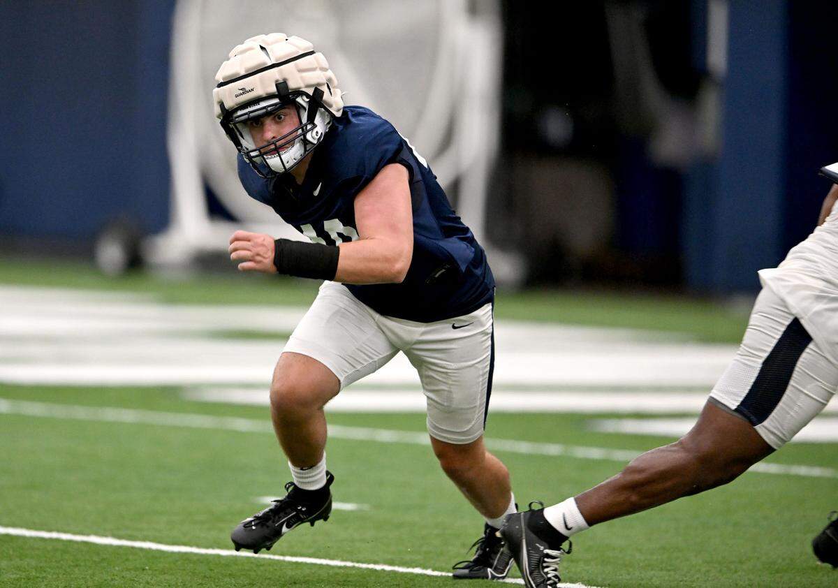 Penn State linebacker Ben Chizmar runs a drill during practice on Saturday, Aug. 3, 2024.