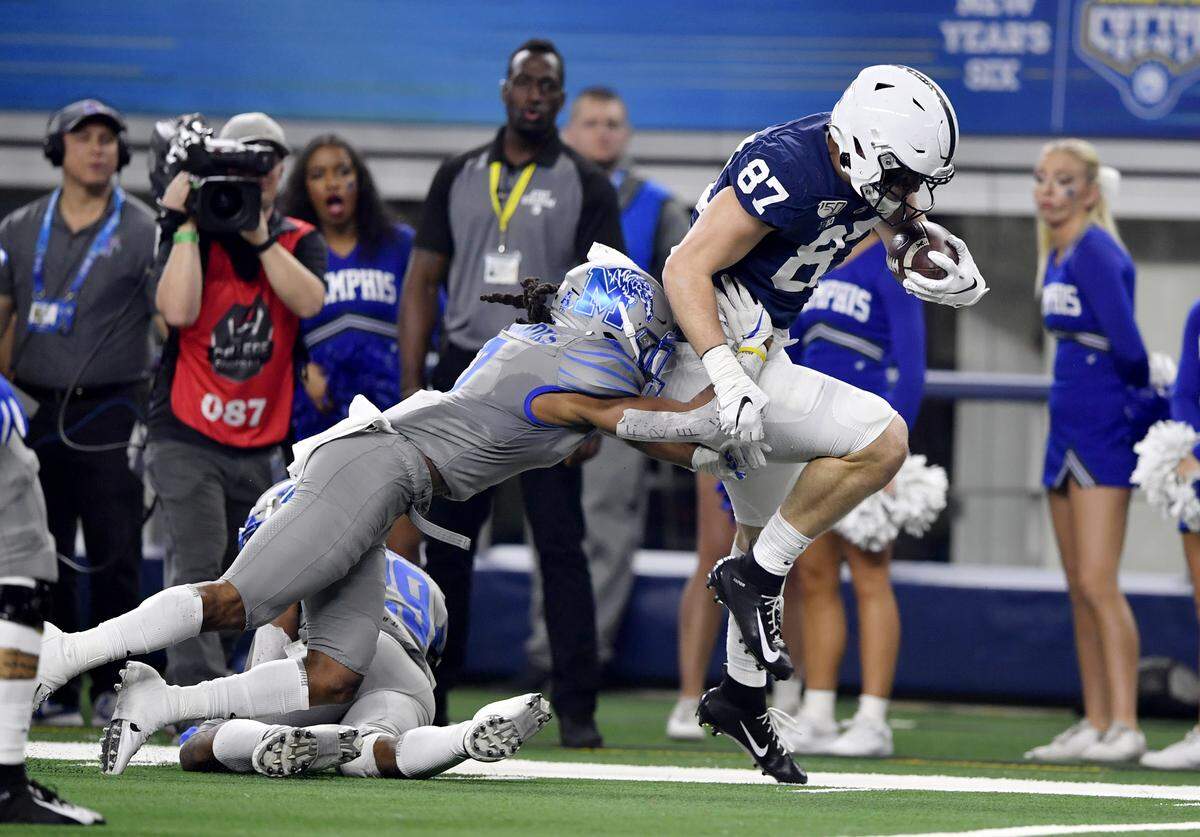 Memphis defensive back ChrisÊClaybrooks knocks Penn State tight end Pat Freiermuth out of bounds as he runs with the ball during the Cotton Bowl at AT&T Stadium in Arlington, TX on Saturday, Dec. 28, 2019.