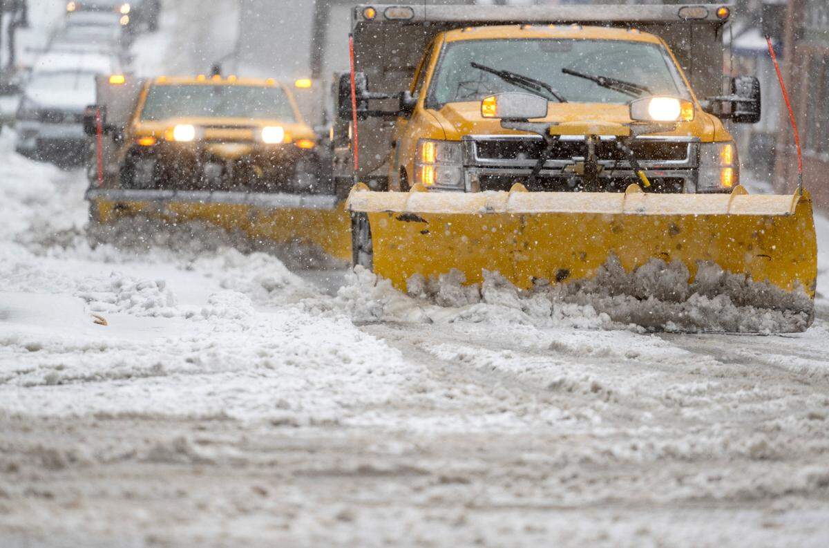 State College Borough plow trucks clear the snow and ice on Allen Street on Thursday, Dec. 15, 2022.