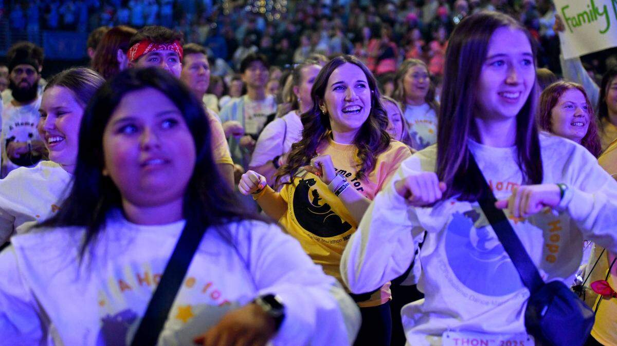 Volunteers and dancers learn the line dance during Penn State Thon on Friday, Feb. 21, 2025.  