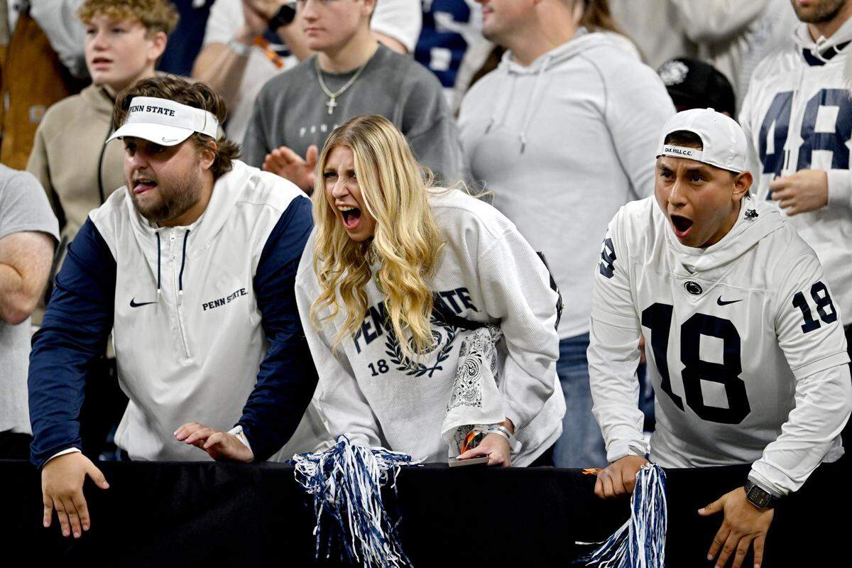 Penn State fans cheer on the Nittany Lions as they take on Oregon in the first half of the Big Ten Championship game at Lucas Oil Stadium on Saturday, Dec. 7, 2024.