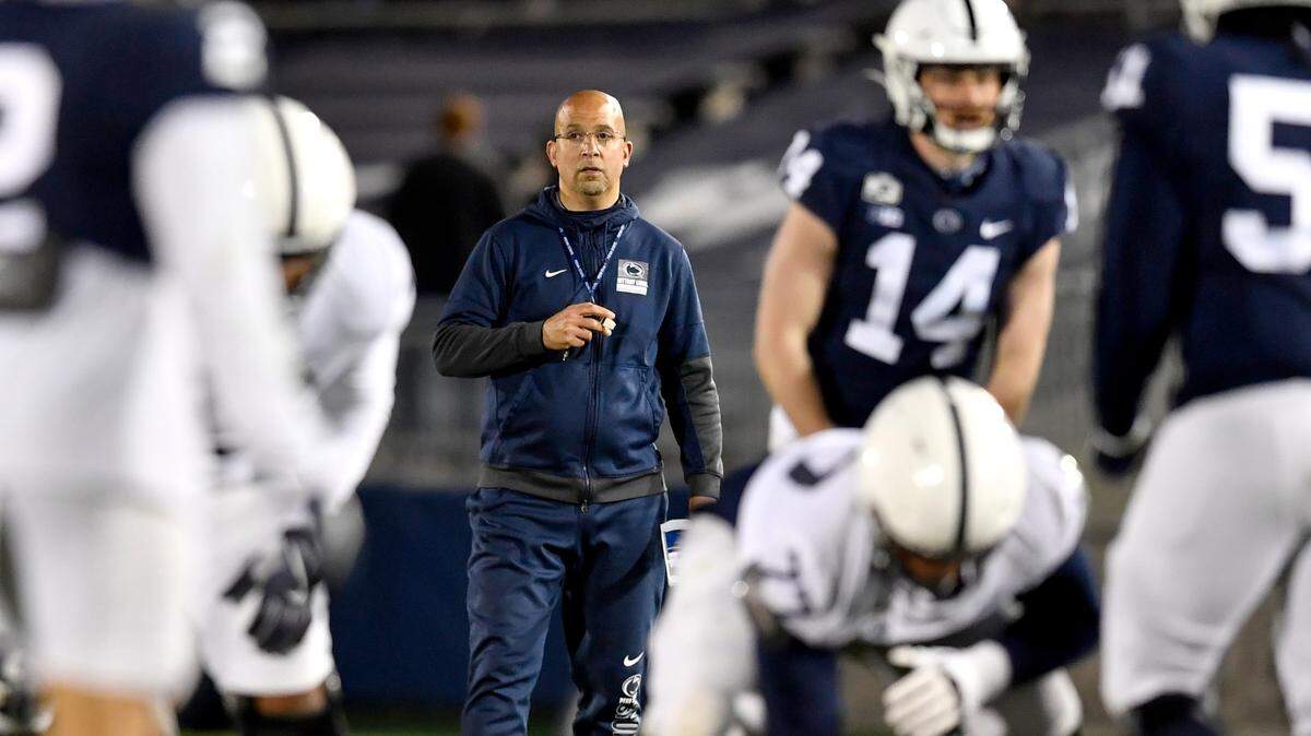 Penn State football coach James Franklin watches players line up for a play at practice on Friday, April 23, 2021 at Beaver Stadium.