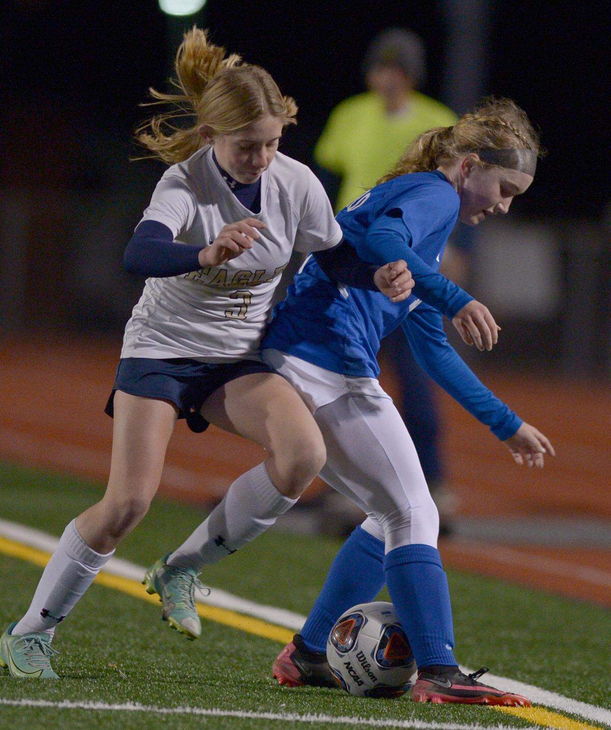 Bald Eagle Area’s Sybil Thompson (left) and Bedford’s Kaitlyn Richardson battle for the ball during first half action Thursday, Nov. 4, 2021 at Altoona’s Mansion Park.