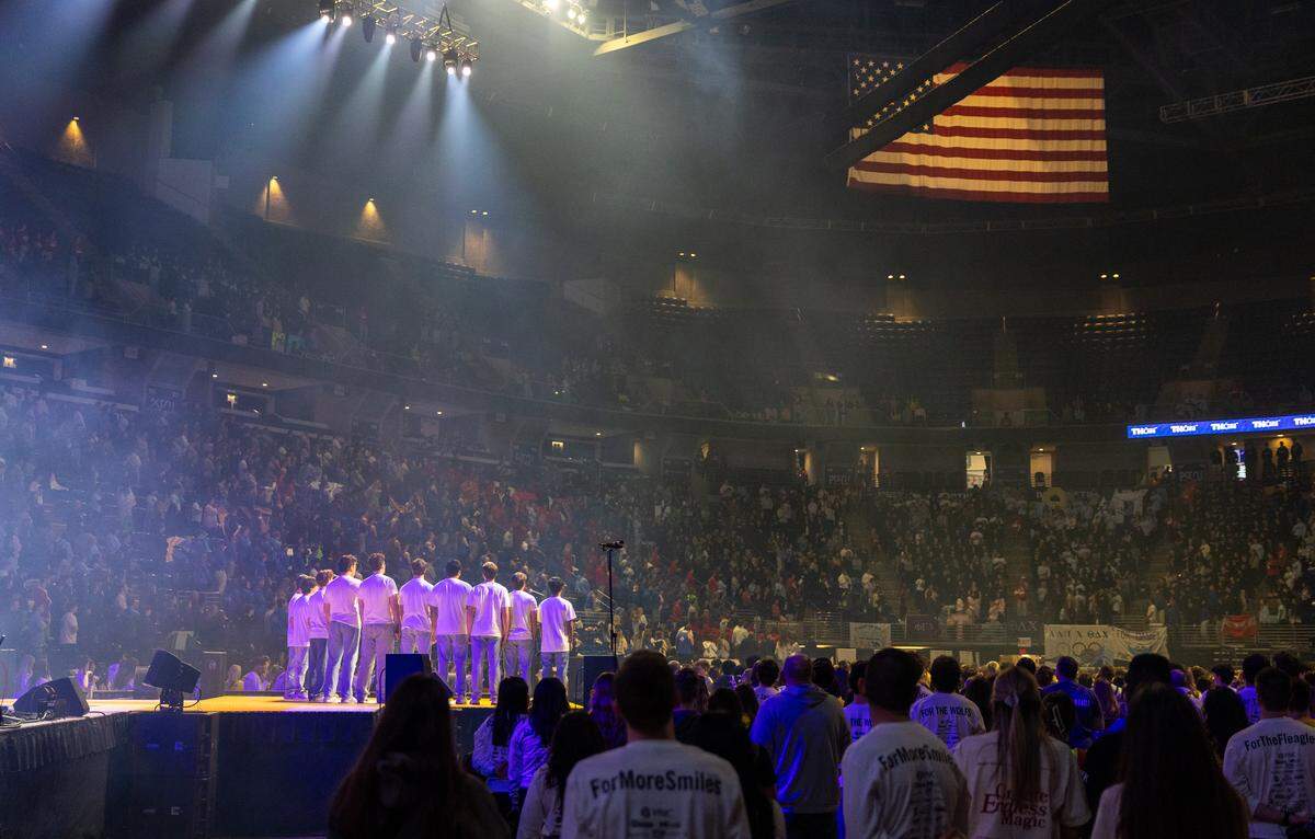 The Statesmen a cappella group sings the national anthem to kick off Thon weekend on Friday, Feb. 20, 2026 in the Bryce Jordan Center.