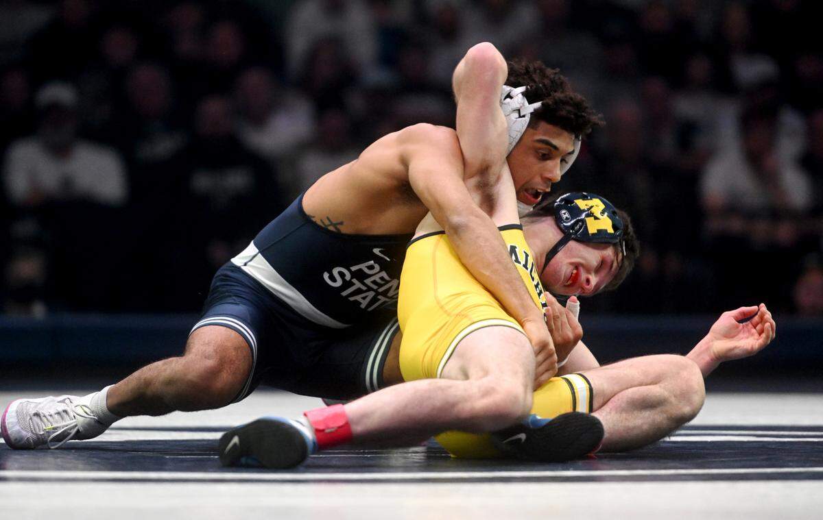 Penn State’s Roman Bravo-Young controls Michigan’s Dylan Ragusin in the 133 lb bout of the match on Friday, Jan. 20, 2023 at the Bryce Jordan Center.