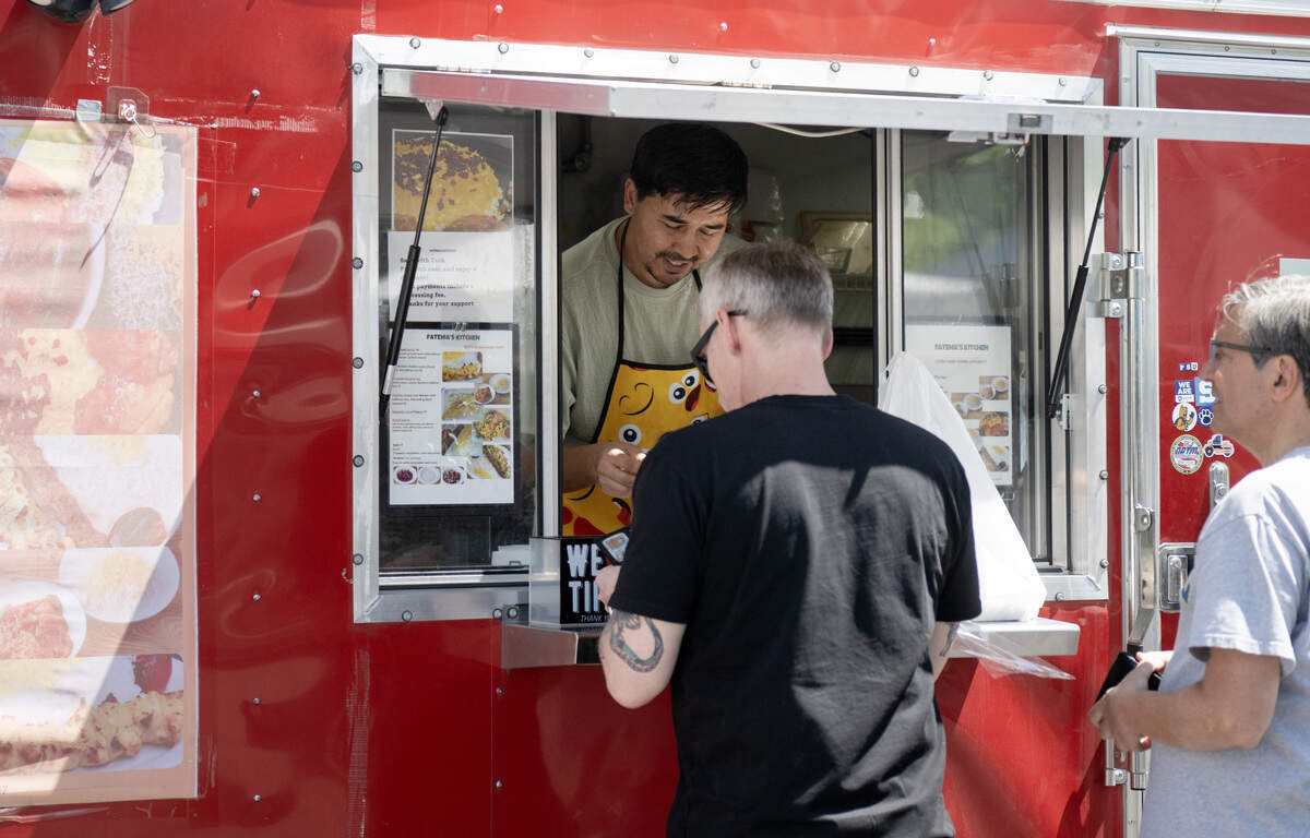Mohammad Hashami of Fatema’s Kitchen takes orders at the Boalsburg Farmers Market on Tuesday, June 2, 2026.