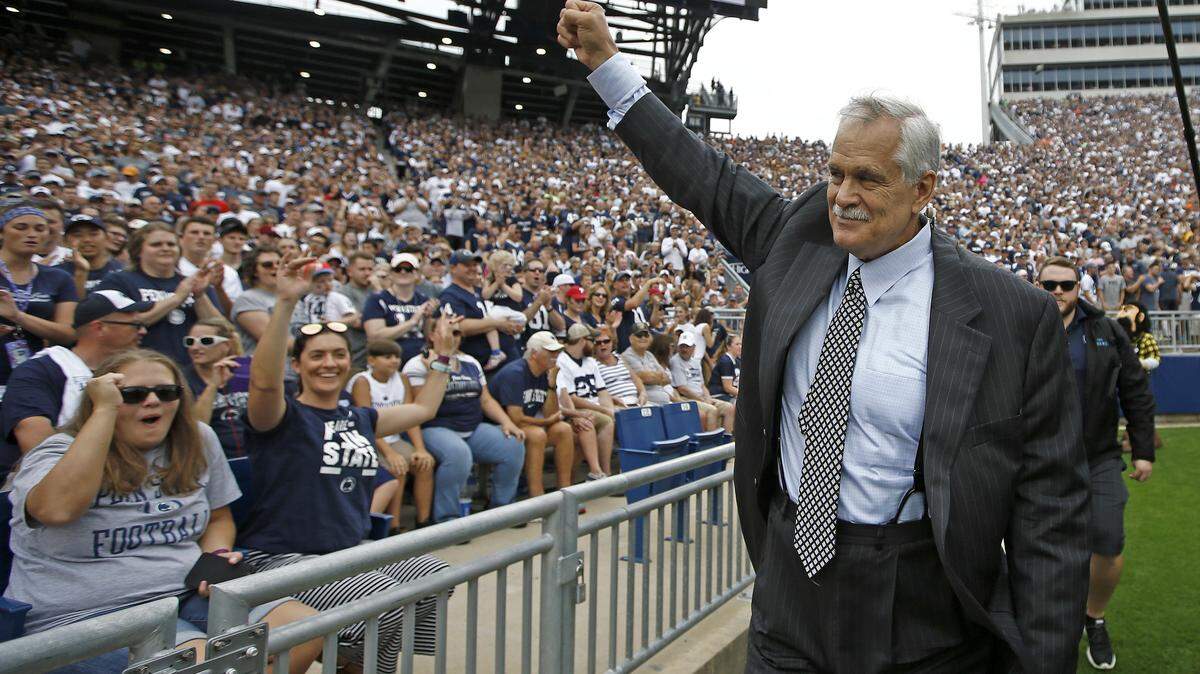 Honorary captain and Penn State alumn Matt Millen waves to the crowd before the team takes on Appalachian State on Sept. 1. Millen will miss the rest of 2018 season as Big Ten Network analyst to focus on his health.