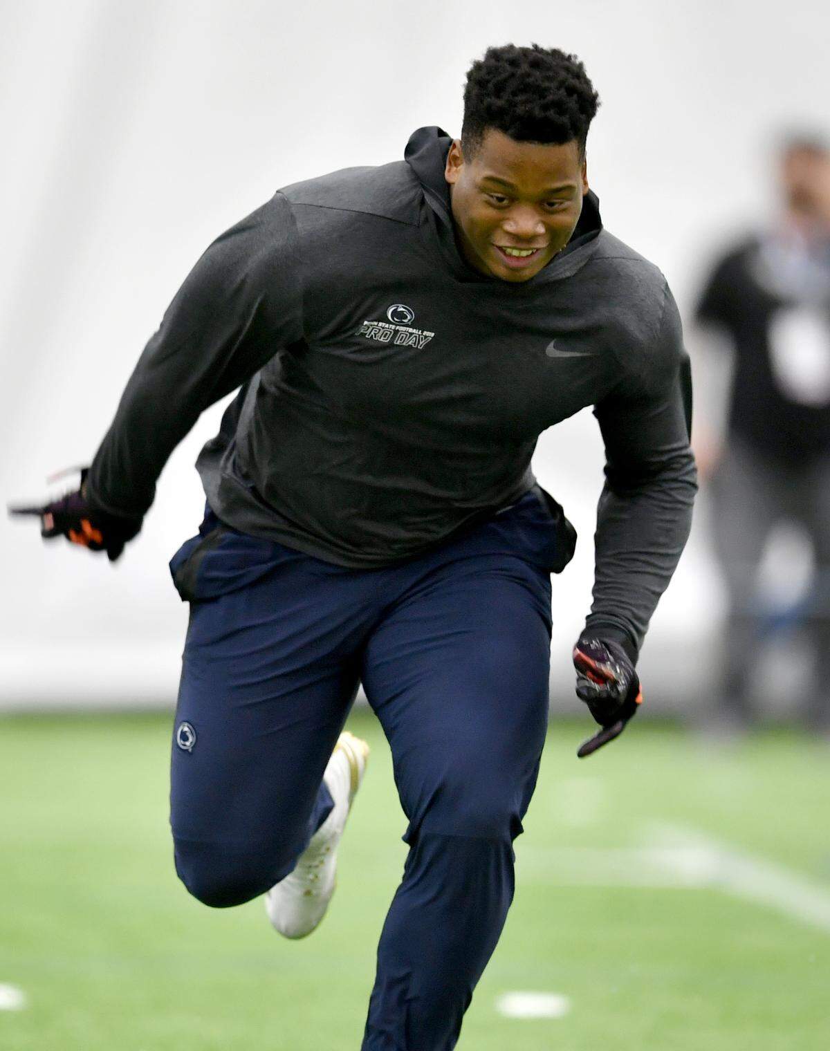 Defensive tackle Kevin Givens runs a drill during Pro day on Tuesday, March 19, 2019 at Holuba Hall.