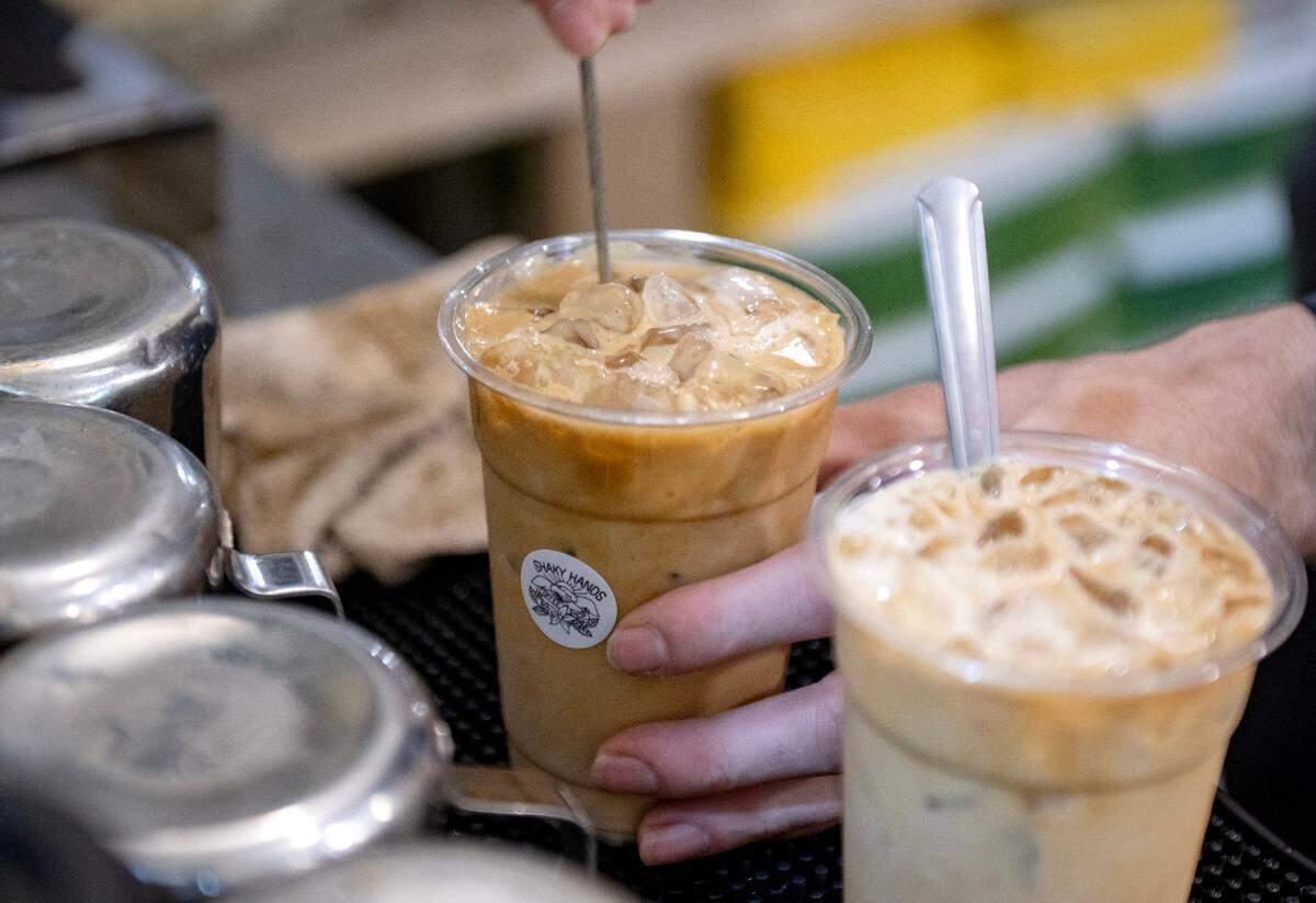 Tyler Wirtz makes drinks at Shaky Hands Coffee Shop on Tuesday, June 10, 2025.