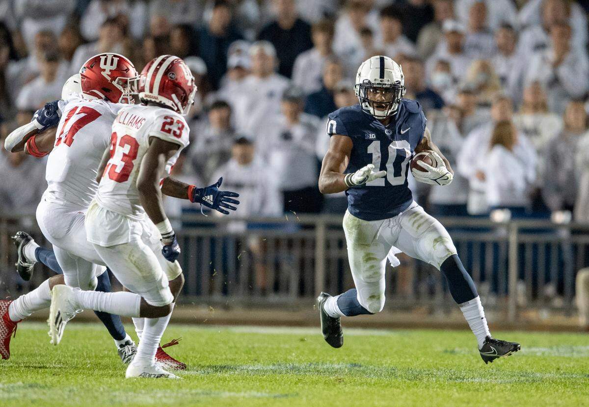 Indiana defenders chase Penn State running back John Lovett.