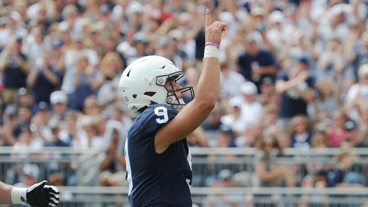 Penn State quarterback Trace McSorley celebrates scoring a touchdown during a game against Kent State Saturday, Sept. 15, 2018 at Beaver Stadium.