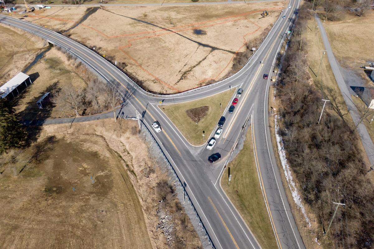 Traffic travels through the intersection of Route 26 and Route 45 in Ferguson Township on Friday, March 4, 2022.