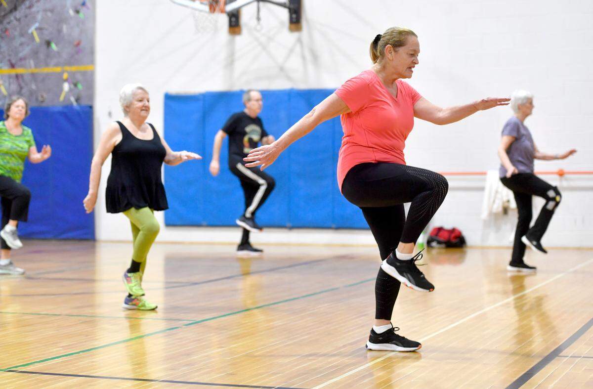 Ellen Deno leads the cardio dance class at the State College YMCA on Friday.