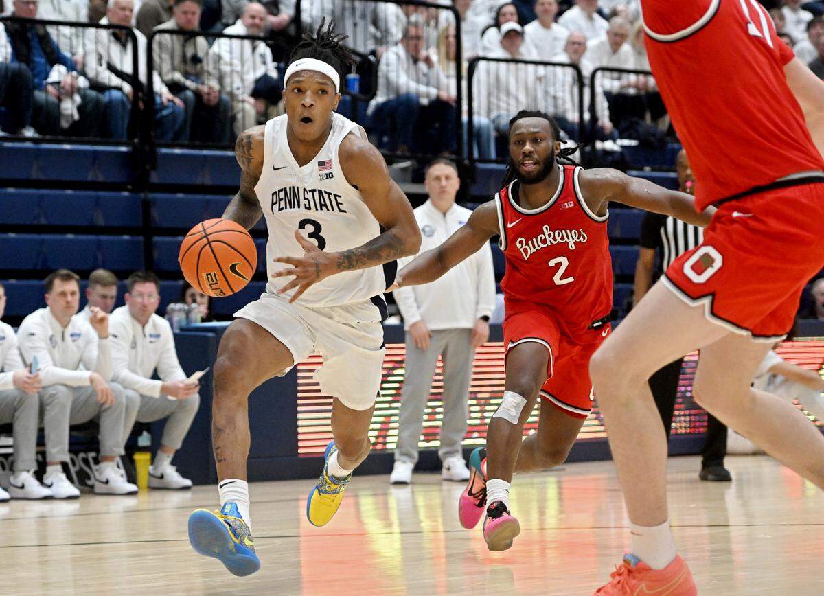 Penn State’s Nick Kern Jr. cuts down the court around the Ohio State defender during the game on Thursday, Jan. 30, 2025 at Rec Hall.