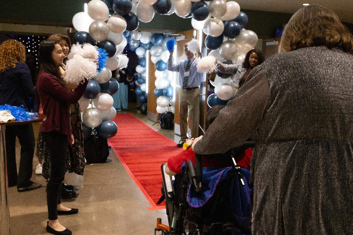 Guests are greeted at Night to Shine on Friday, Feb. 7, 2025.