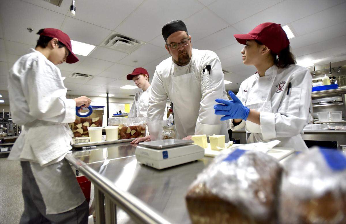 Zach Lorber, the Culinary Arts Instructor at State College Area High School Career and Technical Cente teaches students in February 2019.