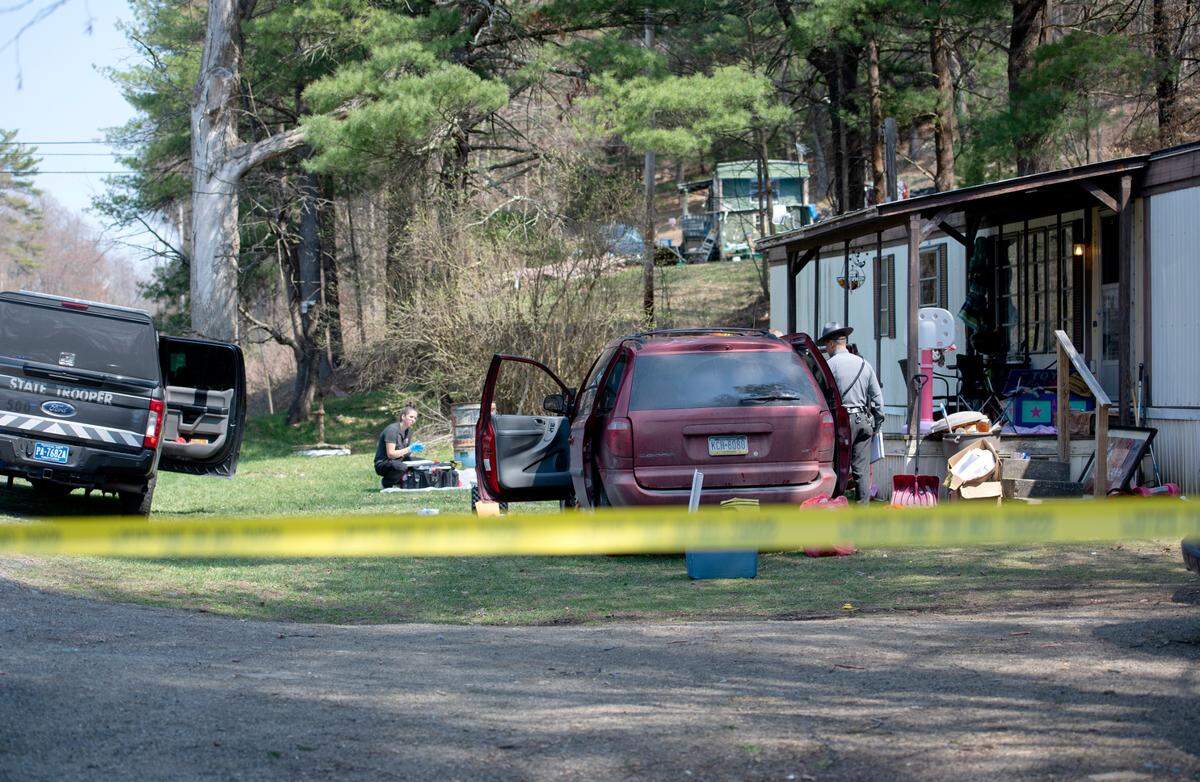Pennsylvania State Police investigated the scene of a homicide on Route 45 in Woodward in April 2021.