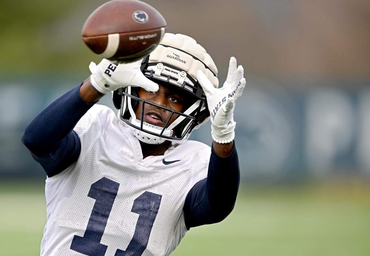Penn State wide receiver Malik McClain makes a catch during practice on Tuesday, April 11, 2023.