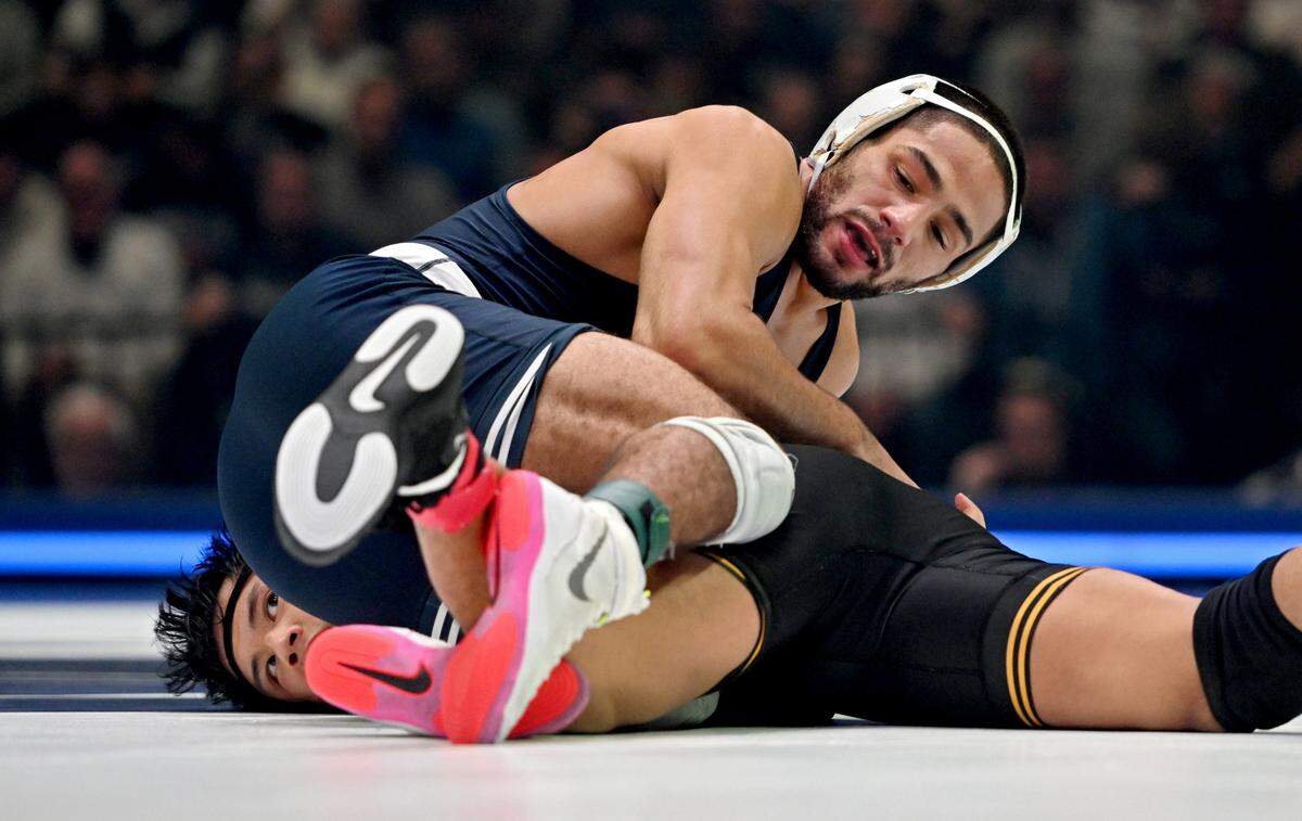 Penn State’s Shayne Van Ness controls Iowa’s Kyle Parco in the 149 lb bout of the match on Friday, Jan. 31, 2025 at the Bryce Jordan Center. Van Ness won by major decision, 17-6.