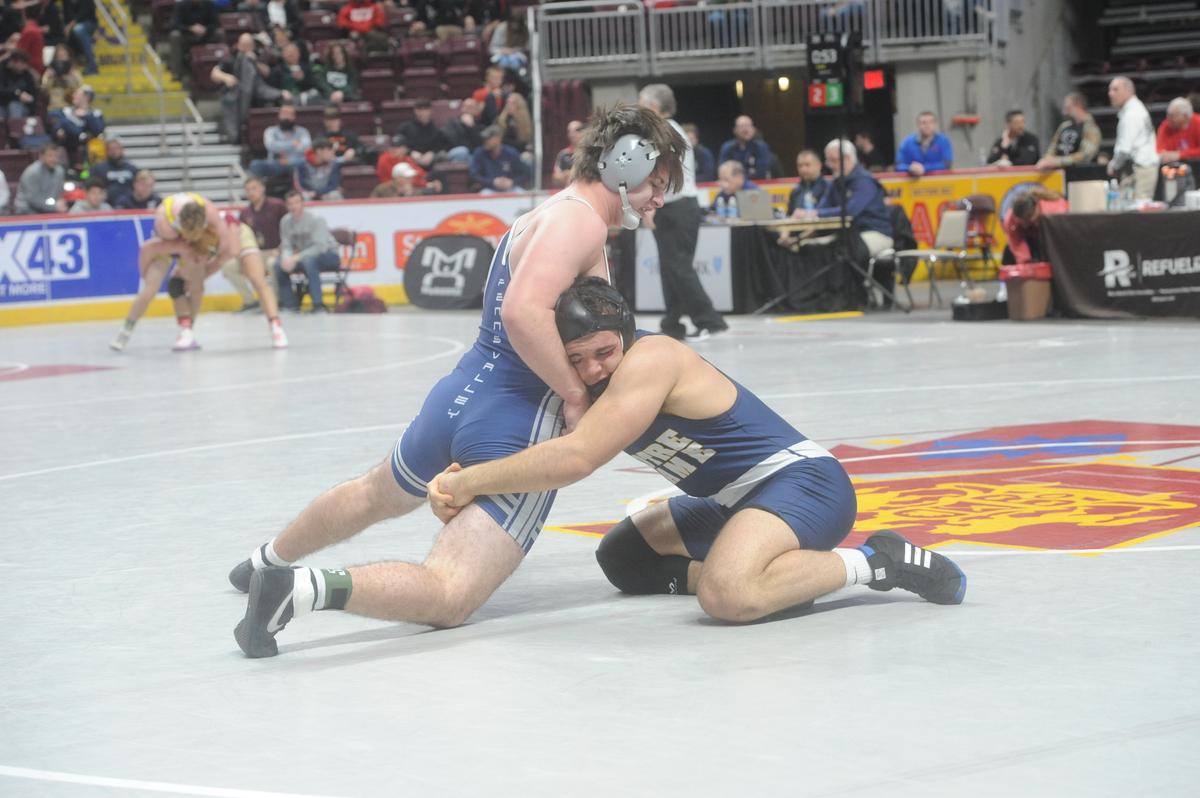 Penns Valley’s Kollin Brungart fights off a takedown attempt from Notre Dame Green Pond’s Jared Blobe in their 215-pound preliminary match of the PIAA Class 2A Championships on Thursday, March 9, 2023 at the Giant Center in Hershey. Brungart topped Blobe, 5-1.
