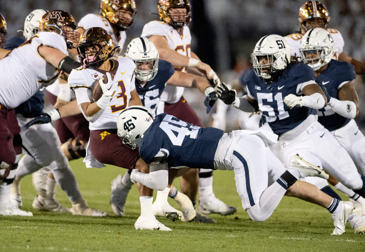 Penn State linebacker Charlie Katshir stops Minnesota’s Trey Potts during first quarter of the game on Saturday, Oct. 22, 2022.