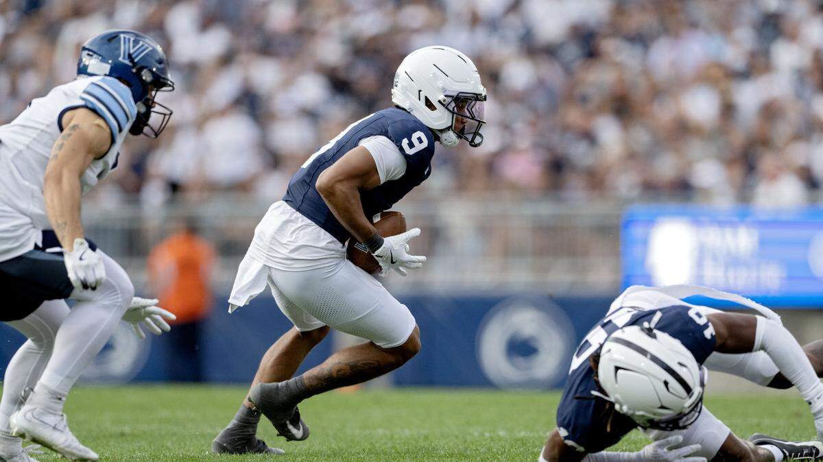 Penn State cornerback Elliot Washington II (9) intercepts a pass against Villanova in a 2025 game.