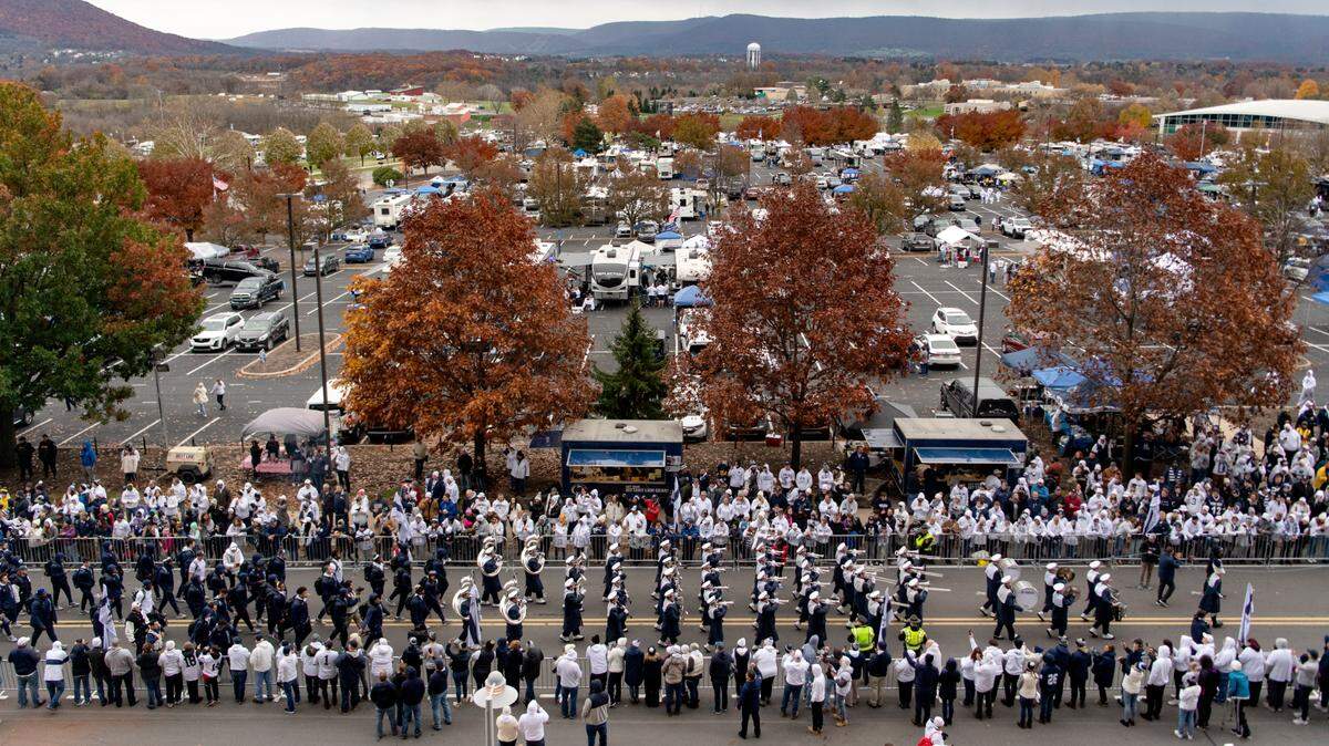 Members of the Penn State Blue band lead the players to Beaver Stadium on Saturday, Nov. 13, 2021 for the game against Michigan.
