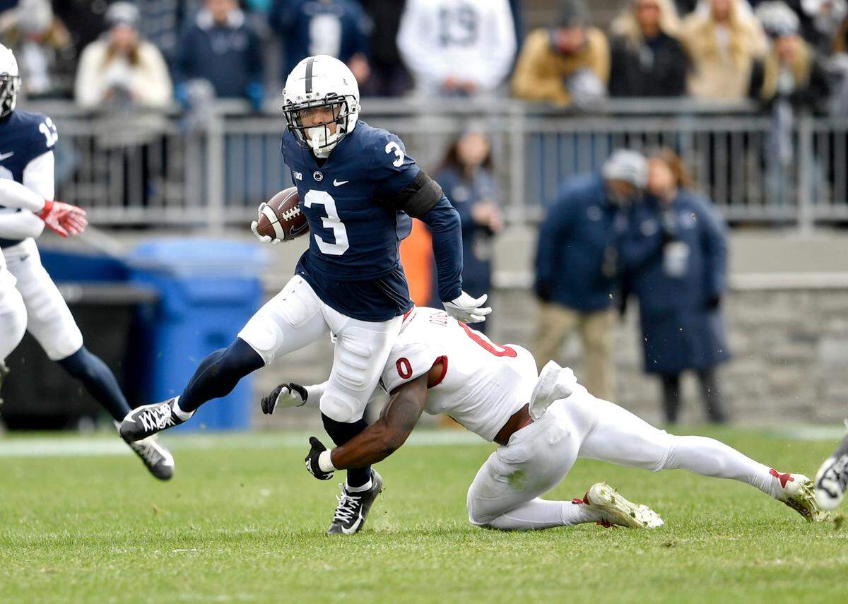 Rutgers defensive back Christian Izien tries to stop Penn State wide receiver Parker Washington during the game on Saturday, Nov. 20, 2021.