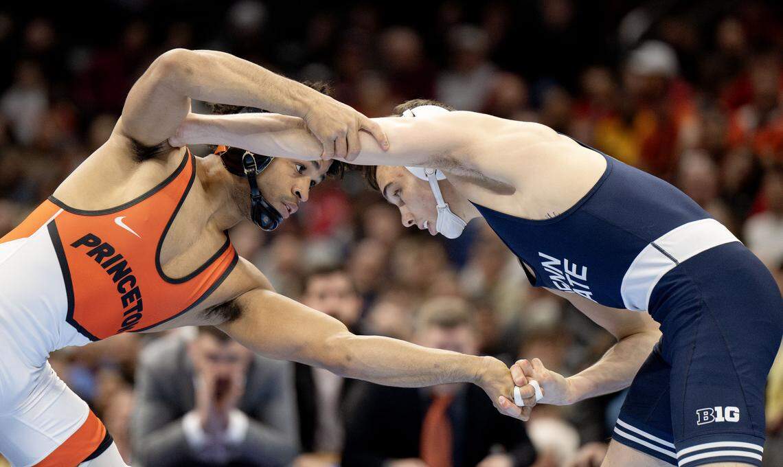 Princeton’s Marc-Anthony McGowan and Penn State's Luke Lilledahl face off in the 125-pound championship bout at the NCAA wrestling championships on Saturday, March 21, 2026.