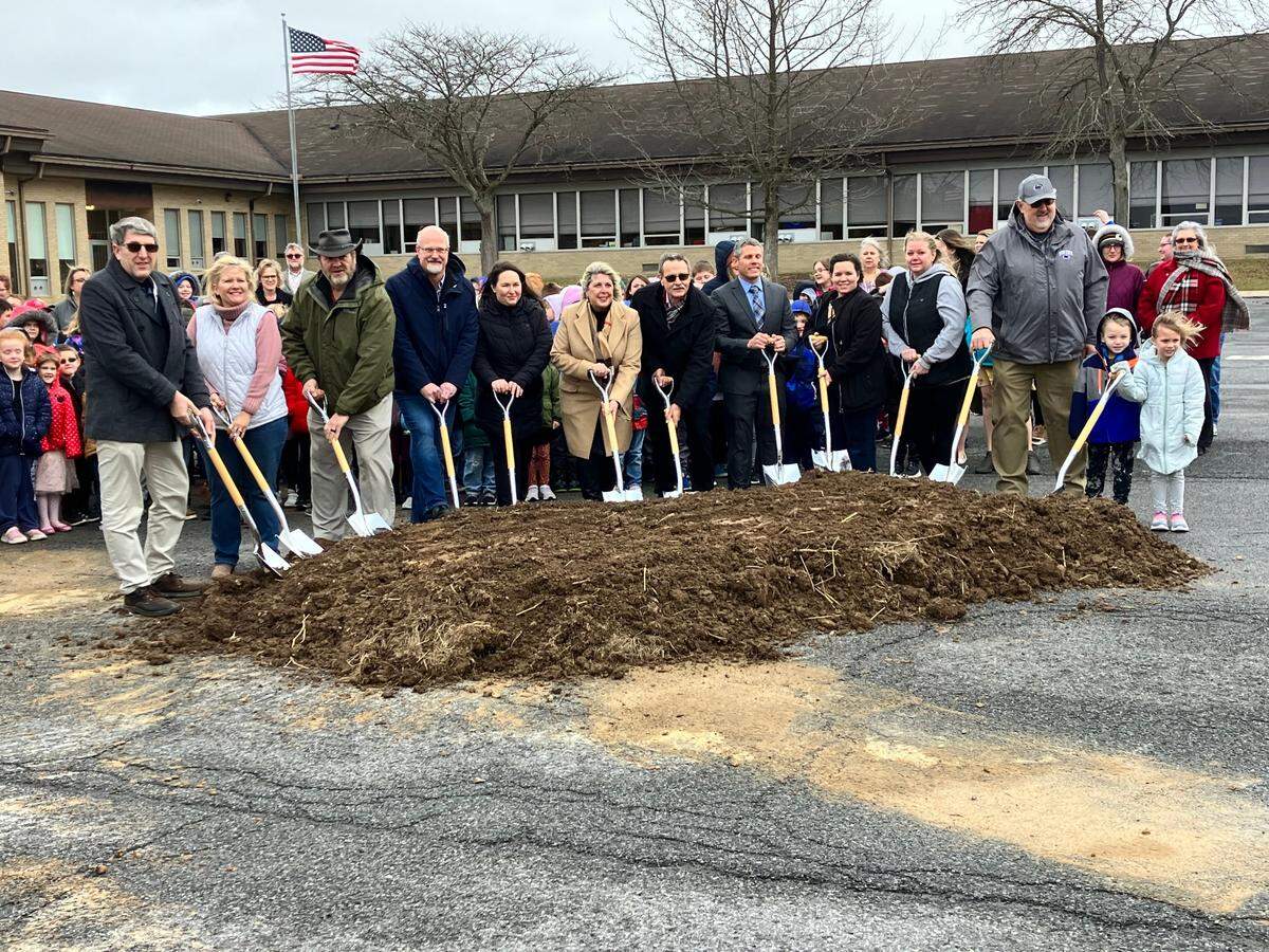 Keystone Central administrators break ground at the site of the new Liberty Curtin Elementary School for Keystone Central School District on Wednesday. Pictured fourth from left is Centre County Commissioner Mark Higgins, followed by Commissioner Amber Concepcion and Keystone Central superintendent Jacquelyn Martin.