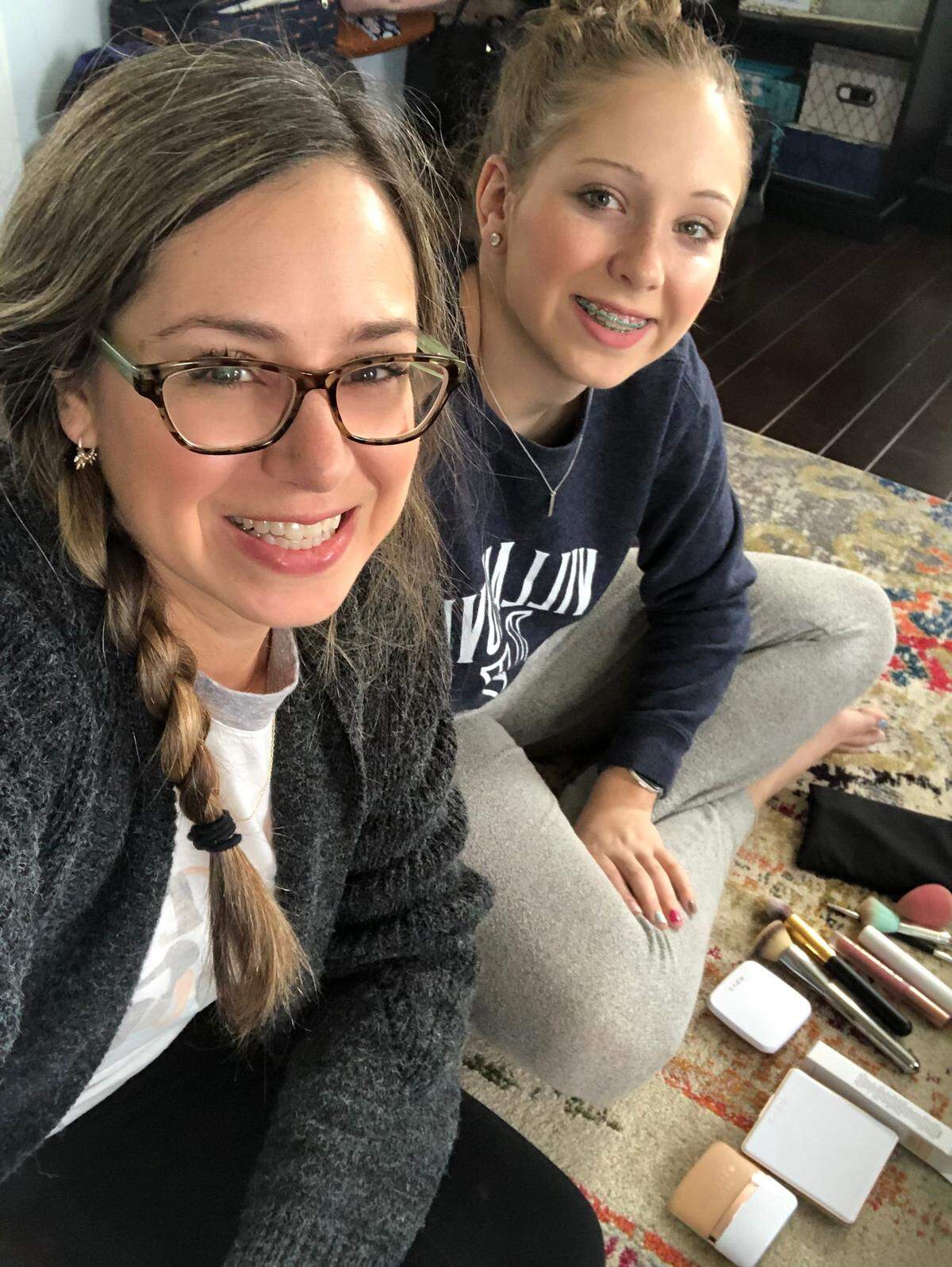 Bethany Underwood, a personal stylist, and her daughter conduct a makeup tutorial on Facebook Live for Underwood’s customer base during the COVID-19 shutdown.