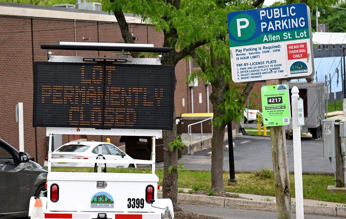 A digital signs tells drivers the Allen Street parking lot will permanently close May 13.