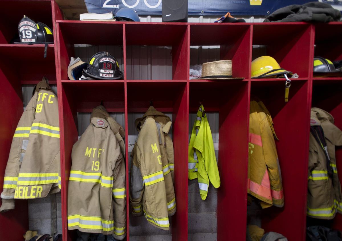 A wall of firefighter equipment in the Miles Township Fire Department on Jan. 10.
