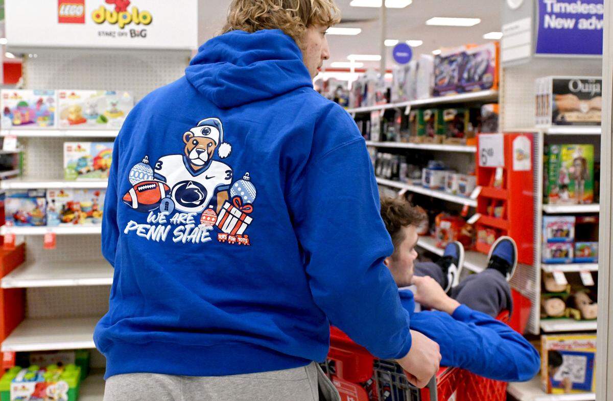 West Shore Homes had Penn State football players help them go on a shopping spree for Toys for Tots at Target on Monday, Dec. 2, 2024.
