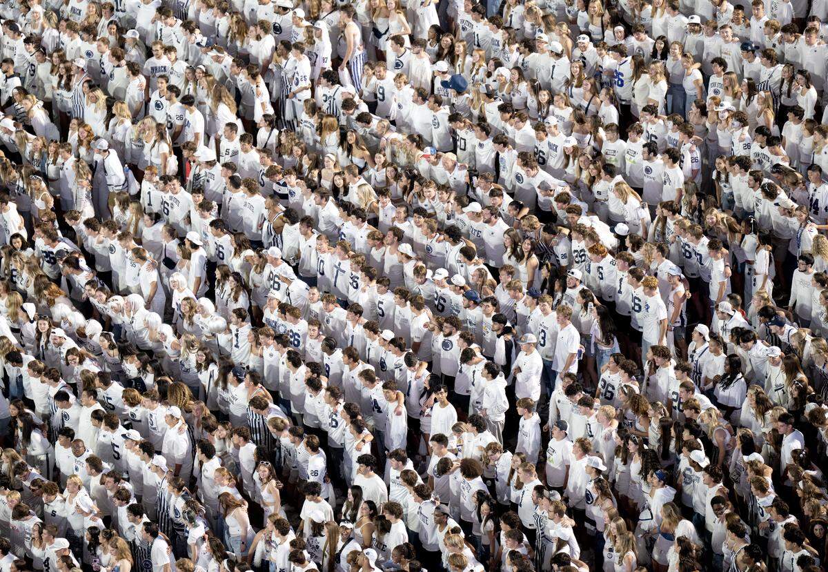 The Penn State student section sings the alma mater before the White Out game against Oregon on Saturday, Sept. 27, 2025.  