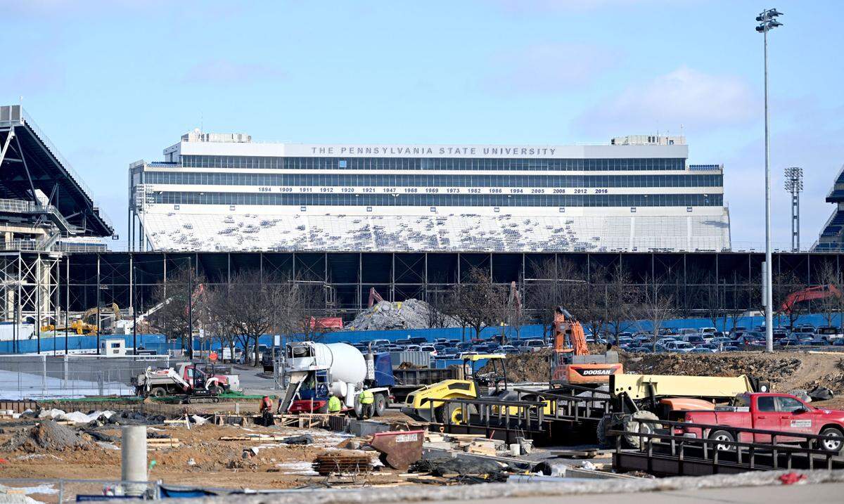 A look at Beaver Stadium with the upper west side and press box demolished on Wednesday, Jan. 15, 2025. In the foreground crews work on the Jeffrey Field Soccer Complex and Indoor Practice Bubble.
