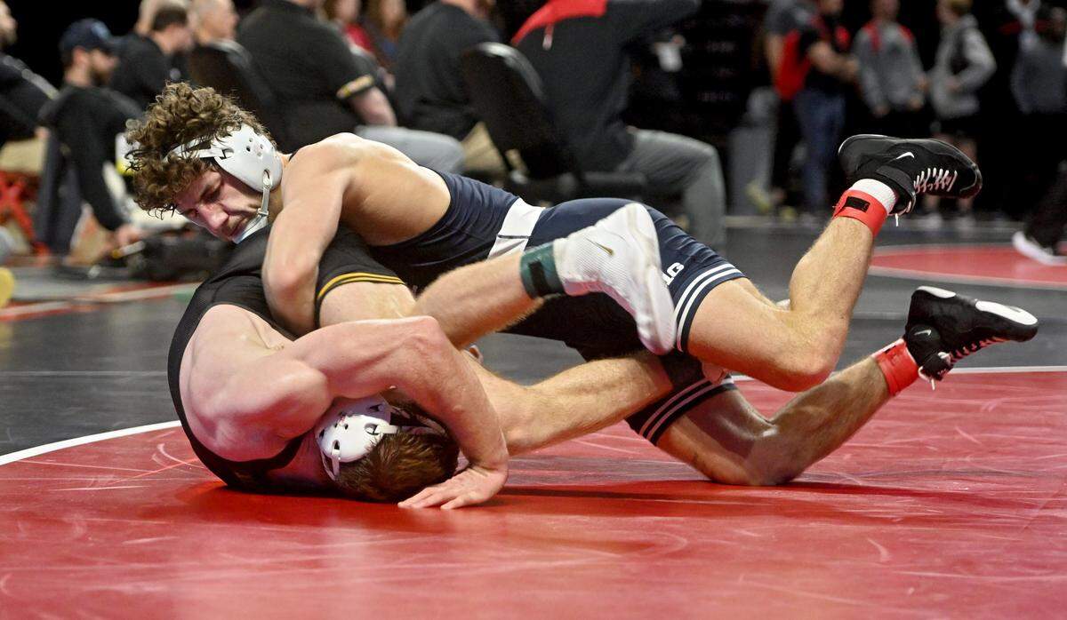Penn State’s Mitchell Mesenbrink controls Iowa’s Mike Caliendo in a 165 lb semifinal bout of the Big Ten Wresting Championships at the Xfinity Center at the University of Maryland on Saturday, March 9, 2024.