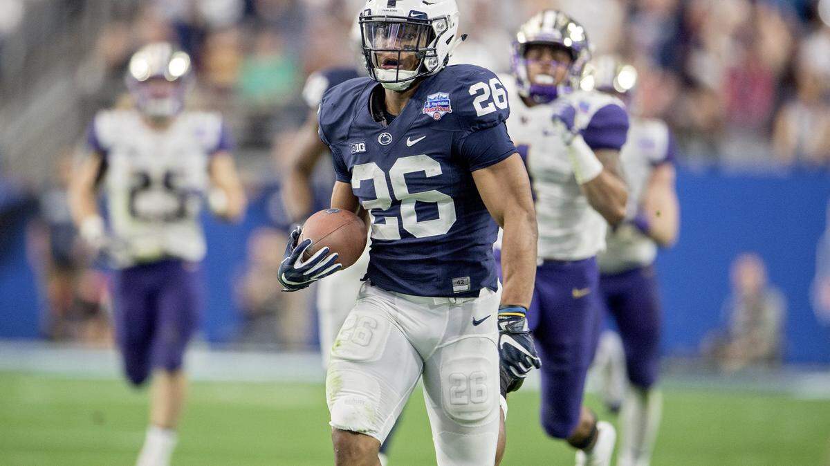 Penn State running back Saquon Barkley runs 92 yards for a touchdown  during the 2017 Fiesta Bowl on Saturday, December 30, 2017 at University of Phoenix Stadium.  The Nittany Lions won, 35-28.