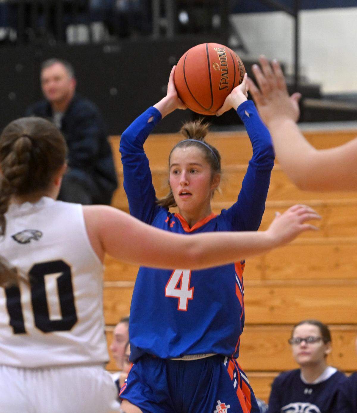 Saint Joseph’s Kita Chappell looks to make a pass over a Bald Eagle Area defender during the game on Tuesday, Dec. 6, 2022.