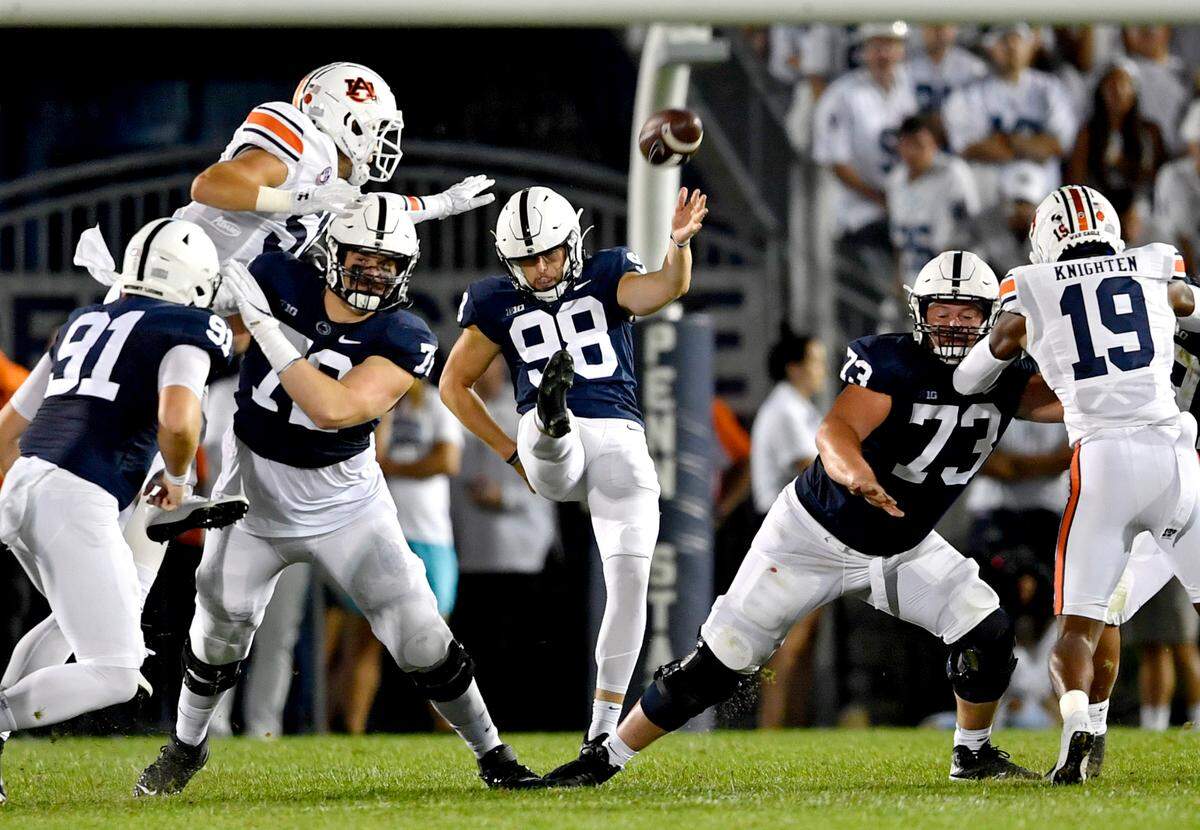 Penn State’s Jordan Stout punts during the game against Auburn on Saturday, Sept. 18, 2021.
