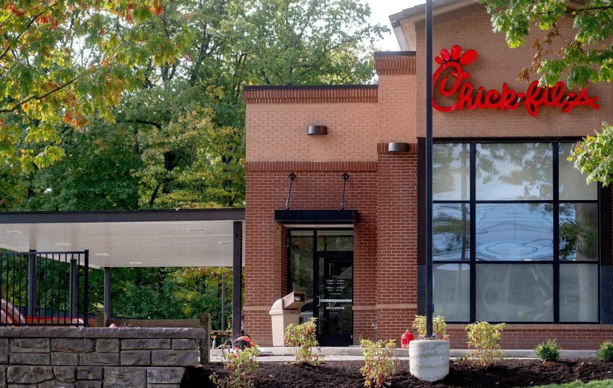 The addition of drive through lanes continues on Wednesday at Chick-fil-A on North Atherton Street.