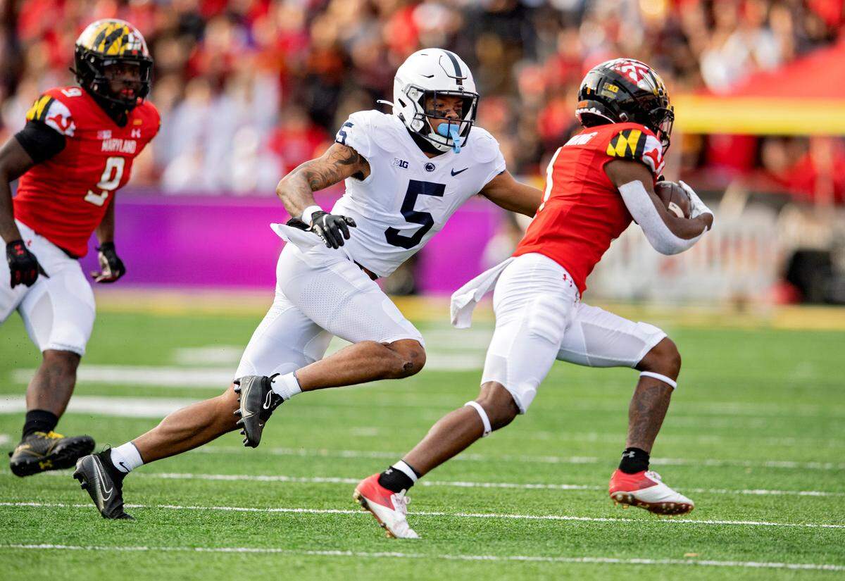 Penn State cornerback Tariq Castro-Fields reaches to stop Maryland’s ball carrier during the game on Saturday, Nov. 6, 2021.