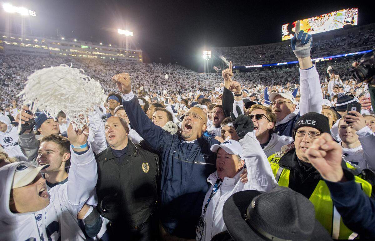 Penn State football coach James Franklin celebrates with the Penn State crowd after the 24-21 win over Ohio State on Saturday, Oct. 22, 2016 at Beaver Stadium.  