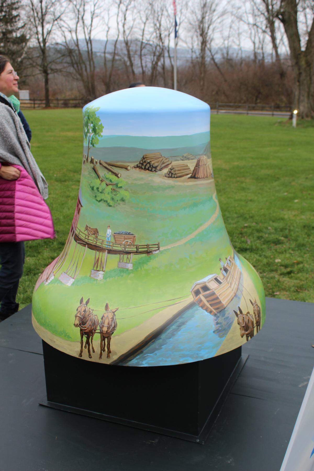 The painted Liberty Bell replica at Eagle Iron Works and Curtin Village.