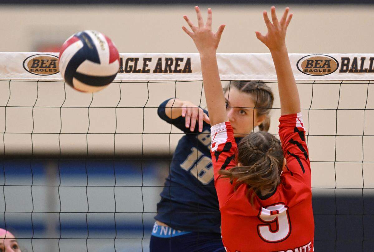 Bald Eagle Area’s Mya Brooks hits the ball past a Bellefonte defender during the District 6 3A semifinal match on Monday, Oct. 30, 2023.