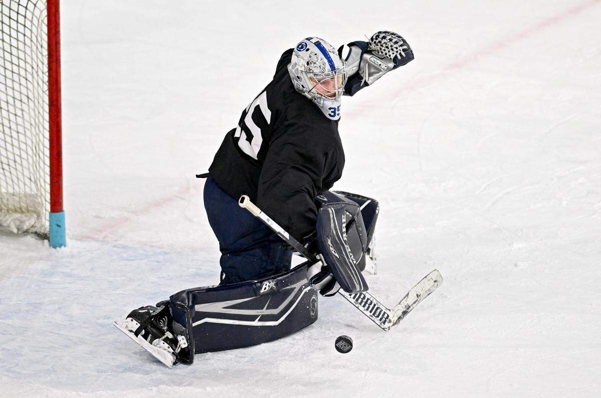 Penn State goalie Arsenii Sergeev blocks as a shot during practice on Monday, April 7, 2025 at Pegula Ice Arena.