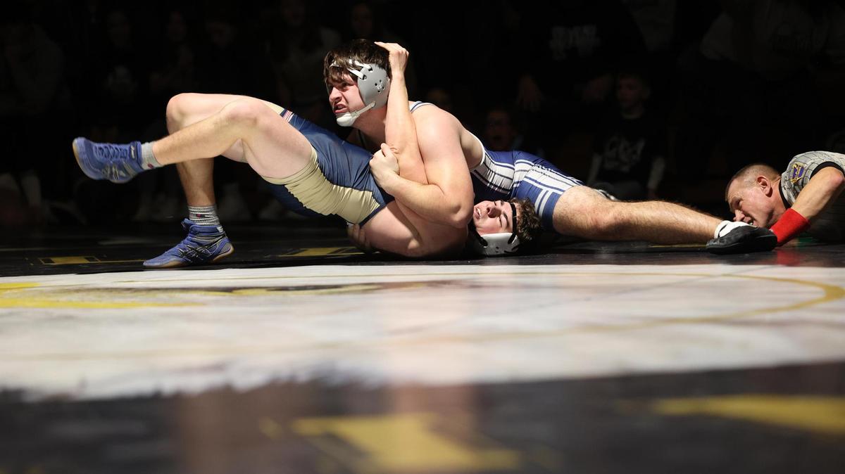 Penns Valley’s Kollin Brungart looks for the pin of Bald Eagle Area’s Nate Fry in their 215-pound bout of the Rams’ 31-27 win on Tuesday, January 10, 2023. Brungart did pin Fry in 1:41.