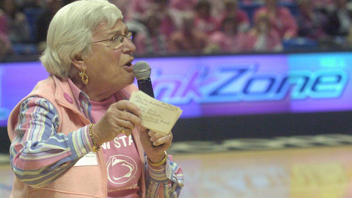 Mimi Barash Coppersmith addresses the crowd at halftime of the Lady Lions basketball game against Illinois during the WBCA Pink Zone game on Sunday, Jan. 24, 2010. 